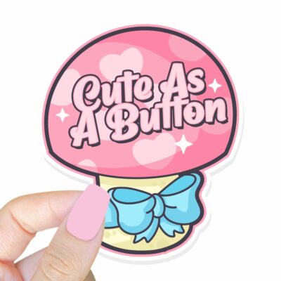 This image shows an hand-drawn adorable sticker, Cute As A Button Sticker, which is available to purchase from HunnieByte.com