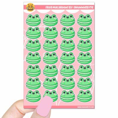 This image shows an adorable hand-drawn sticker sheet, Frog Macaroons Sticker Sheet, which is available to purchase from HunnieByte.com