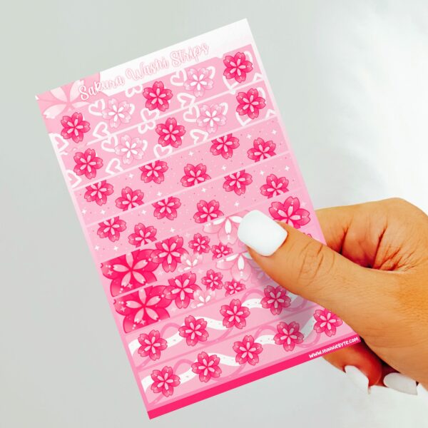 This image shows an adorable hand-drawn sticker sheet, Sakura Washi Strips Sticker Sheet, which is available to purchase from HunnieByte.com