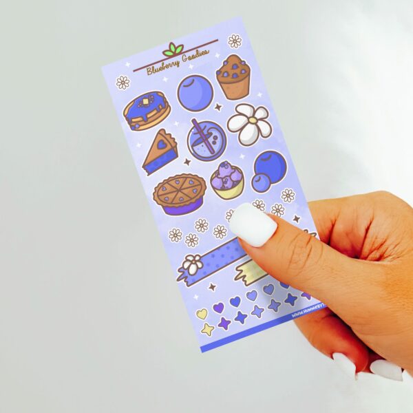 This image shows an adorable hand-drawn sticker sheet, Blueberry Goodies Sticker Sheet, which is available to purchase from HunnieByte.com