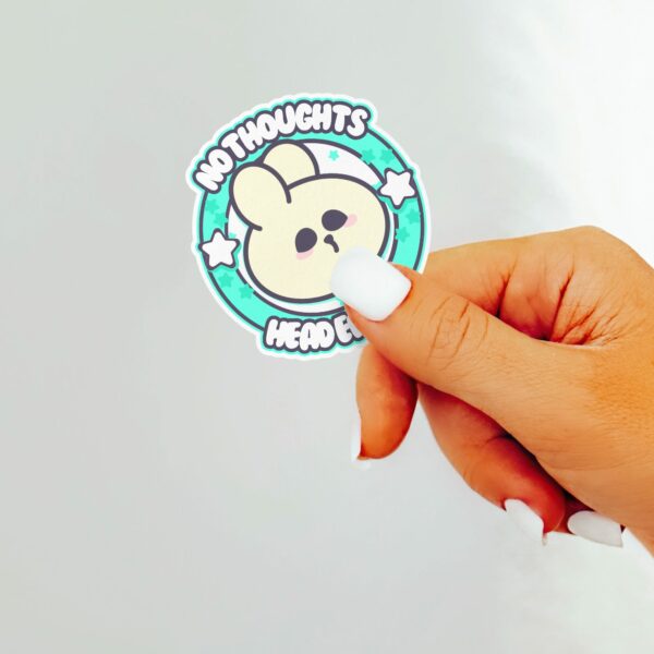 This image shows an hand-drawn adorable sticker, No Thoughts Head Empty Bunny Sticker, which is available to purchase from HunnieByte.com