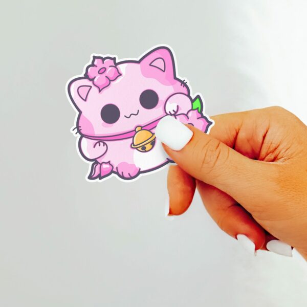 This image shows an hand-drawn adorable sticker, Pink Lotus Lucky Cat Sticker, which is available to purchase from HunnieByte.com