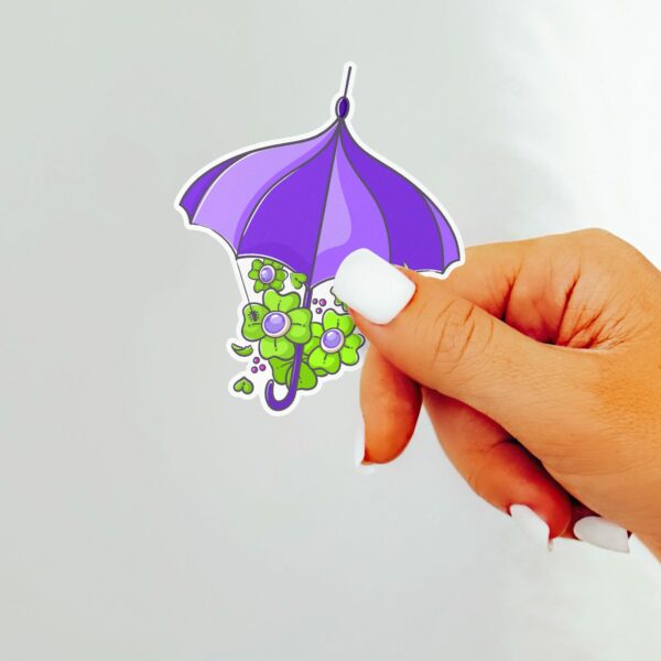 This image shows an adorable hand-drawn sticker, Creepy Umbrella Sticker, which is available to purchase from HunnieByte.com