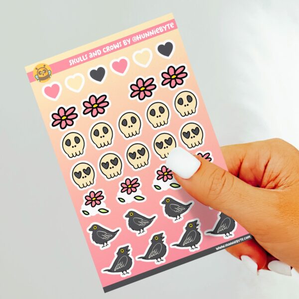 This image shows an adorable hand-drawn sticker sheet, Crow and Skulls Sticker Sheet, which is available to purchase from HunnieByte.com