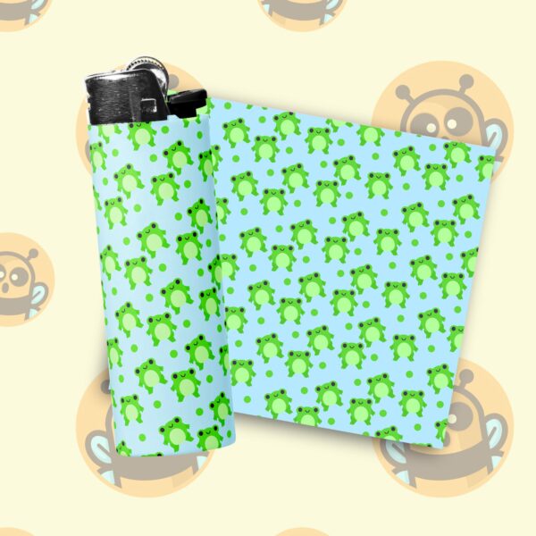 This image shows an adorable hand-drawn lighter wrap, Froggy Fun Lighter Wraps, which is available to purchase from HunnieByte.com